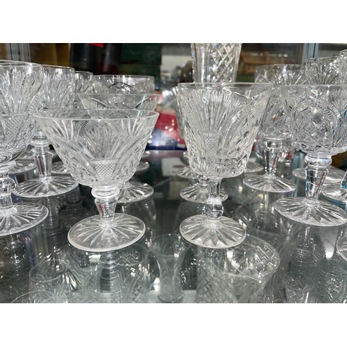 257 - SHELF OF GOOD QUALITY CUT GLASSWARE INCLUDING WINE GLASSES