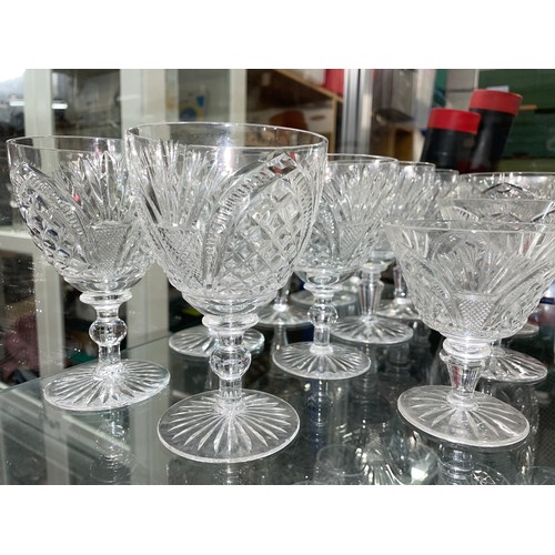 257 - SHELF OF GOOD QUALITY CUT GLASSWARE INCLUDING WINE GLASSES