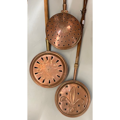 314 - THREE COPPER ANTIQUE STYLE WARMING PANS