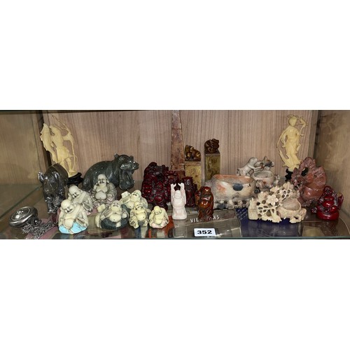 352 - SHELF OF ORIENTAL SOAPSTONE MINIATURE CARVINGS, VASES, ANIMAL TOPPED SEALS, RESIN FIGURES OF MONKS