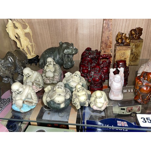 352 - SHELF OF ORIENTAL SOAPSTONE MINIATURE CARVINGS, VASES, ANIMAL TOPPED SEALS, RESIN FIGURES OF MONKS