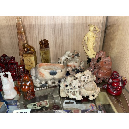 352 - SHELF OF ORIENTAL SOAPSTONE MINIATURE CARVINGS, VASES, ANIMAL TOPPED SEALS, RESIN FIGURES OF MONKS