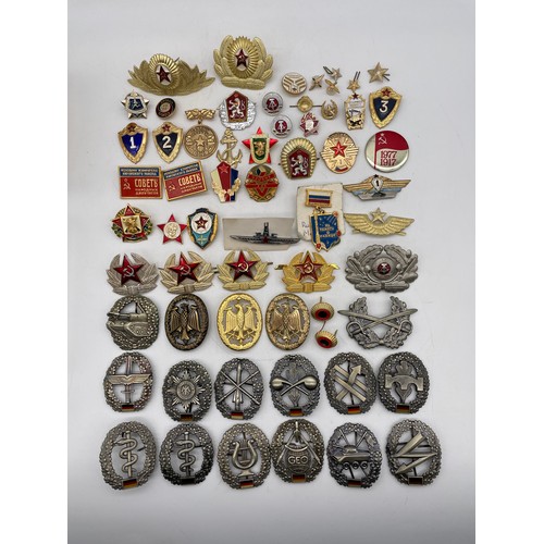 587 - TUB OF RUSSIAN AND EASTERN EUROPEAN MILITARY TYPE BADGES AND INSIGNIA, AND FACSIMILE BADGES