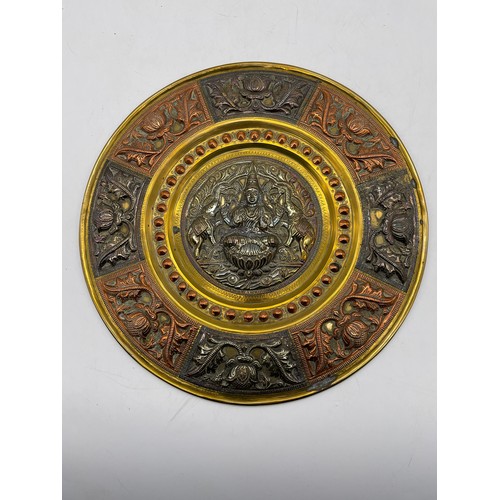 591 - 20TH CENTURY WHITE METAL COPPER AND BRASS EASTERN BAS RELIEF WALL PLATE