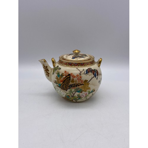 543 - JAPANESE SATSUMA EARTHERNWARE SQUAT TEAPOT DECORATED WITH BUTTERFLIES AND FOLIAGE A/F