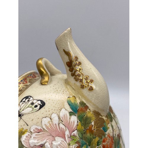 543 - JAPANESE SATSUMA EARTHERNWARE SQUAT TEAPOT DECORATED WITH BUTTERFLIES AND FOLIAGE A/F