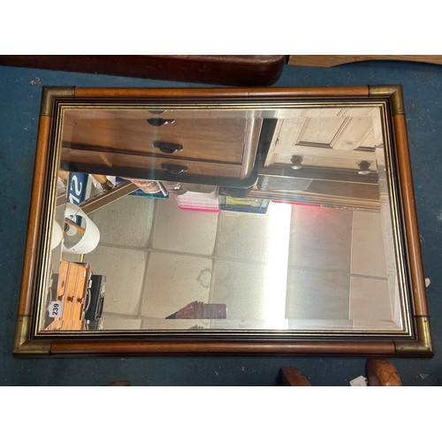 239 - BRASS AND WOODEN FRAMED MIRROR