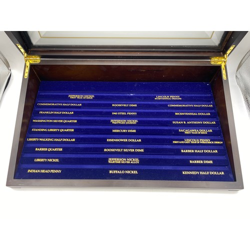 635 - GLAZED PRESENTATION CASE OF COLLECTIBLE COINS OF AMERICA MOUNTED IN SLATE EFFECT SLABS