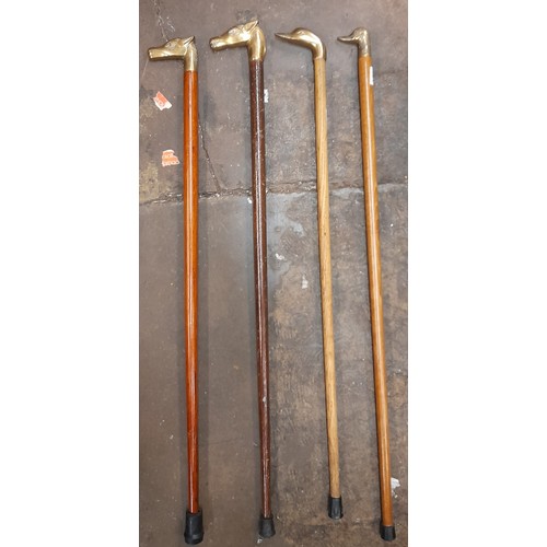 451 - FOUR BRASS HORSE AND DUCK HEAD FINIAL WALKING CANES