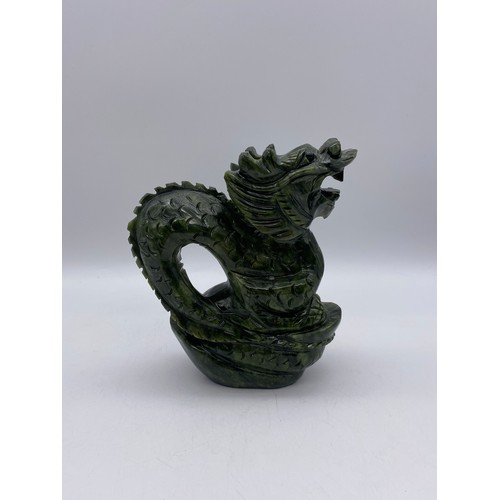 524 - CHINESE CARVED GREEN SOAP STONE DRAGON ON ROCK FIGURE