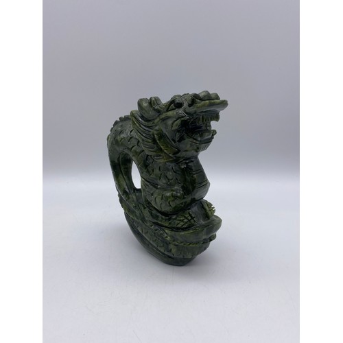 524 - CHINESE CARVED GREEN SOAP STONE DRAGON ON ROCK FIGURE