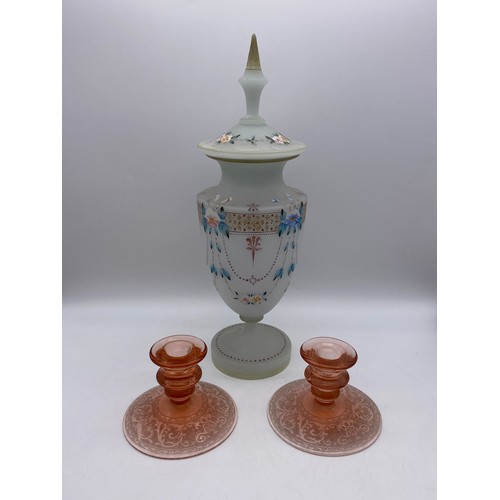 530 - PAINTED OPAQUE OVOID JAR AND COVER AND PAIR OF PEACH BLUSH GLASS ETCHED CANDLE STICKS