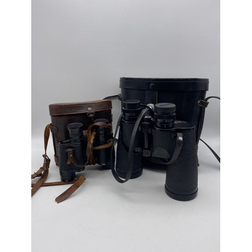 552 - PAIR OF ZENITH STEREO BINOCULARS IN LEATHER CASE, AND PAIR OF CANON 7X50 COATED BINOCULARS