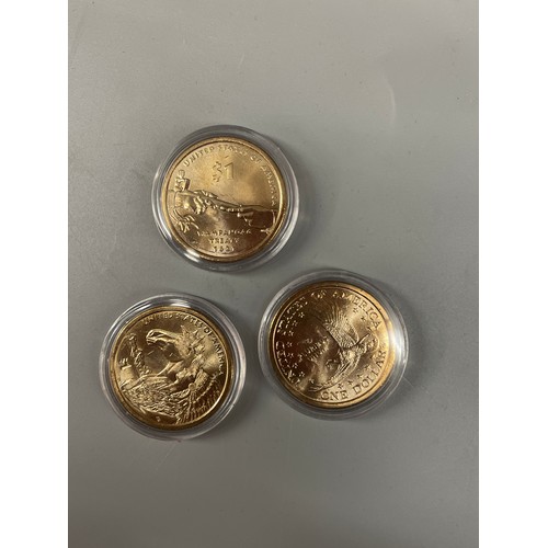 617 - SLANT FRONTED GLAZED CASE THE COMPLETE COLLECTION OF SACAGAWEA DOLLAR WITH CERTIFICATE