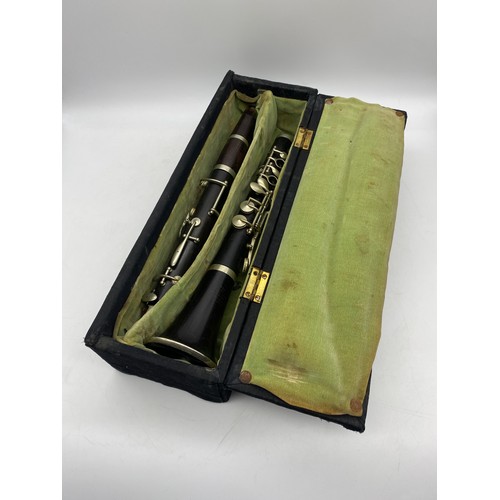 497 - CASED HARD WOOD CLARINET BOOSEY AND CO LONDON 22859