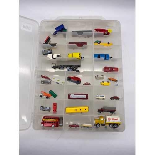 504 - COMPARTMENTED BOX OF WEST GERMAN MINIATURE PLASTIC TOY AND WAGON MODELS