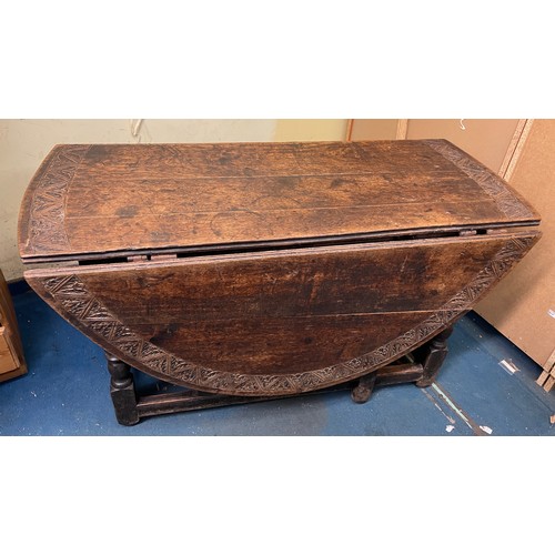 18 - 18TH CENTURY OAK DROP FLAP GATE LEG TABLE WITH LATER CARVED TOP