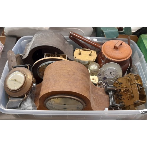 320 - CRATE CONTAINING A CLOCK MOVEMENT, CLOCK CASES, CARRIAGE CLOCKS, AND RELATED ITEMS