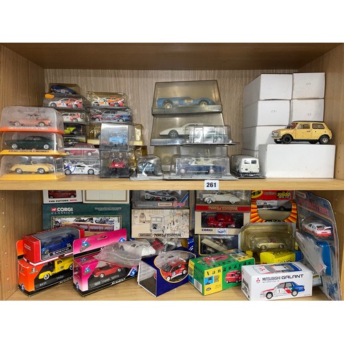 261 - TWO SHELVES OF BOXED DIE CAST MODEL CARS BY MATCHBOX, CORGI, VANGUARD, SOLIDO AND OTHERS