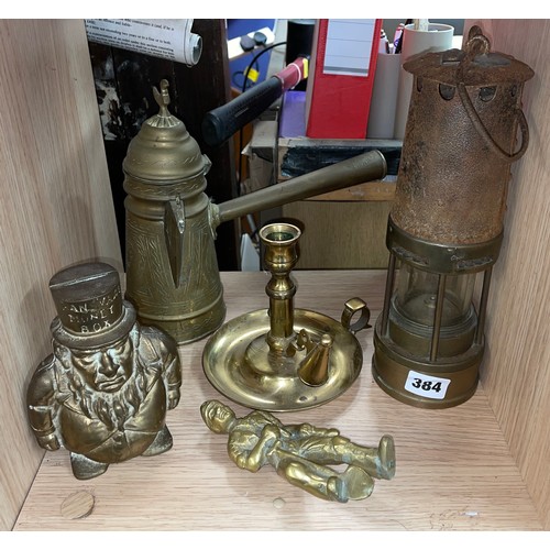 384 - BRASS CHAMBER STICK, MINERS SAFETY LAMP, EASTERN ENGRAVED COFFEE EWER, AND A TRANSVAAL BRASS MONEY B... 