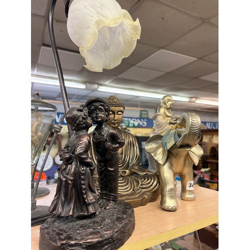 341 - RESIN PATINATED KISSING COUPLE TABLE LAMP, SEATED BUDDA, AND ELEPHANT AND BUDDA FIGURE