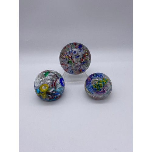 407 - THREE LATTICINIO GLASS PAPERWEIGHTS