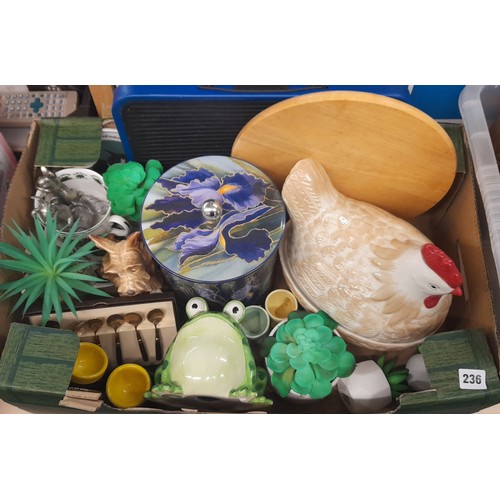 236 - BOX CONTAINING POTTERY HEN BASKET, ARTIFICIAL POTTED PLANTS, NOVELTY EGG CUPS, CHOPPING BOARD, ETC