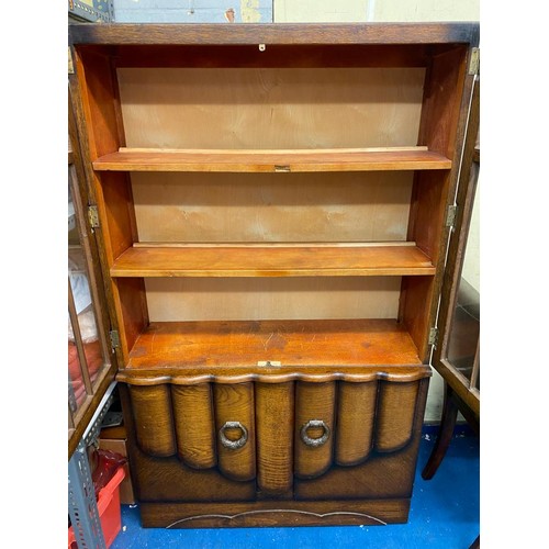 95 - OAK GLAZED SERPENTINE FRONTED CABINET CUPBOARD