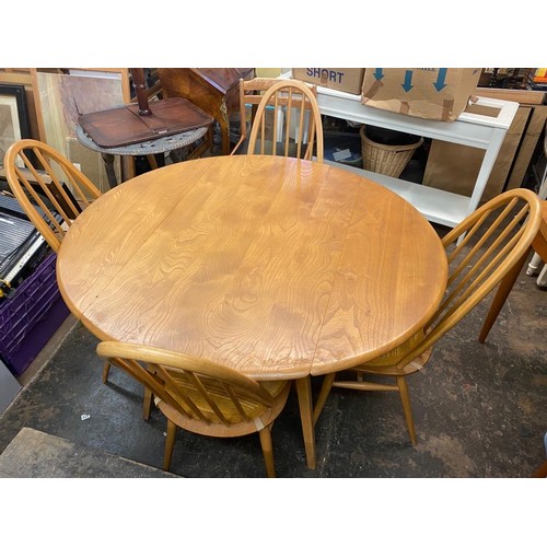 112 - ERCOL LIGHT ELM DROP FLAP TABLE AND FOUR STICK BACK CHAIRS