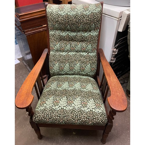 185 - EARLY 20TH CENTURY OAK FRAMED RECLINING ARMCHAIR UPHOLSTERED IN LIBERTY BUTTONED FABRIC