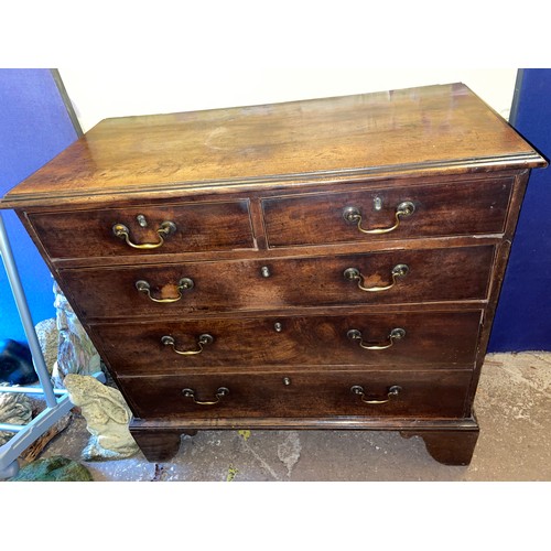 139 - GEORGE III MAHOGANY TWO OVER THREE DRAWER CHEST ON BRACKET FEET