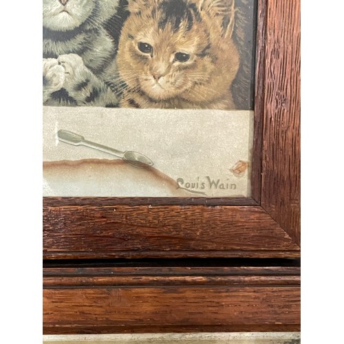 352 - THREE EARLY 20TH CENTURY LITHOGRAPHIC PRINTS OF CATS AFTER LOUIS WAIN