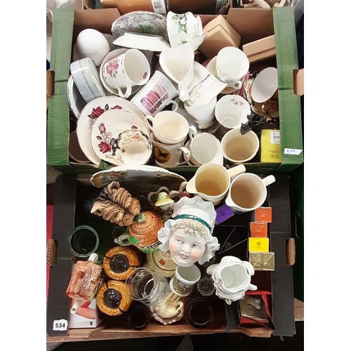 534 - TWO CARTONS OF VARIOUS BONE CHINA TEACUPS AND SAUCER TRIOS, MOP LADY JAR AND COVER, WATER JUGS, AND ... 