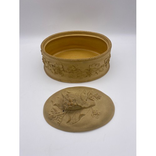 629 - WEDGWOOD BISCUIT WARE OVAL GAME PIE DISH AND COVER