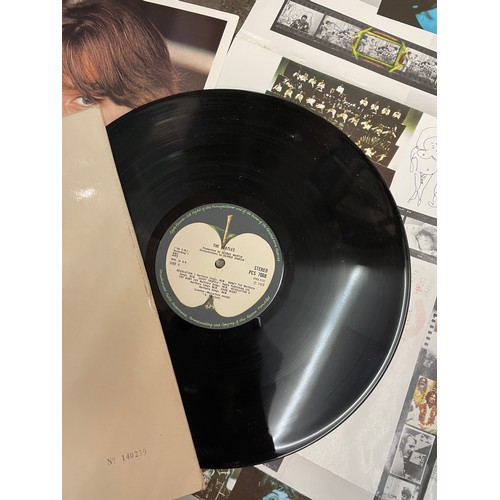 557 - THE BEATLES THE WHITE ALBUM WITH POSTER AND FOUR PORTRAIT PHOTOGRAPHS NUMBER 140239