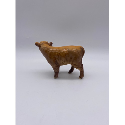 598 - BESWICK GLOSS MODEL OF A CALF