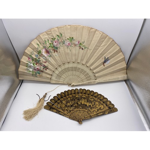 583 - JAPANESE LACQUERED FAN AND A SILK AND PAINTED FAN