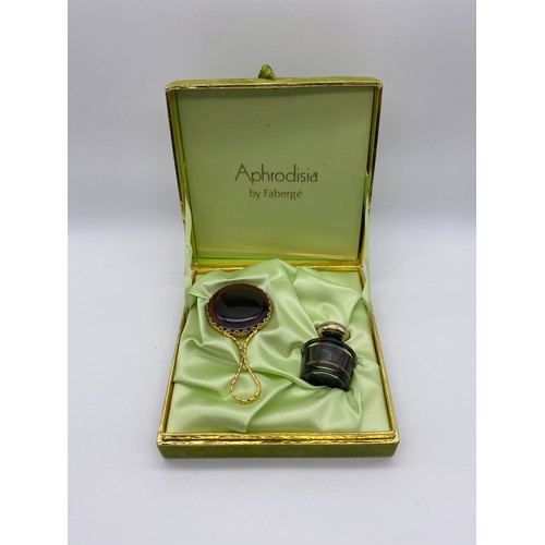 586 - BOXED APHRODISIA BY FABERGE PERFUME AND HAND MIRROR