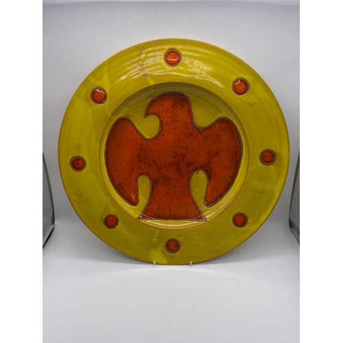 612 - GEOFFREY EASTOP (1921-2014) STUDIO POTTERY OCHRE AND ORANGE BIRD CHARGER 47CM D