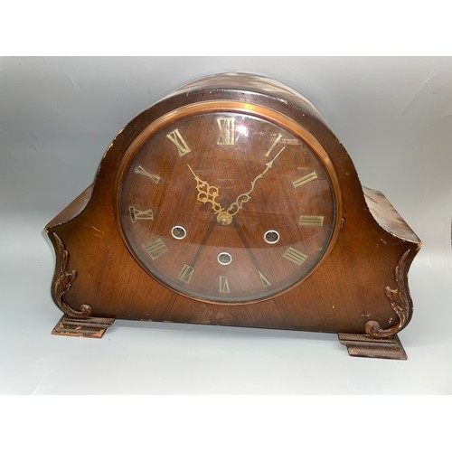 574 - 20TH CENTURY WALNUT CASED CHIMING MANTLE CLOCK