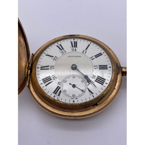 341 - CASHIER GOLD PLATED AND ENGRAVED FULL HUNTER WALTHAM POCKET WATCH WITH ENAMEL DIAL WITH ROMAN AND AR... 