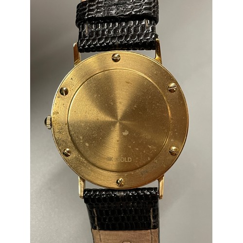 675 - BOXED 9CT GOLD ROTARY ELITE WRISTWATCH ON LEATHER STRAP