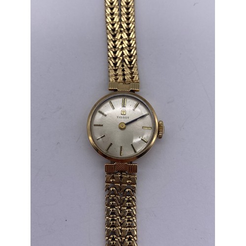 673 - LADIES 9CT GOLD TISSOT WRISTWATCH ON 9CT GOLD STRAP 19.2 G APPROX