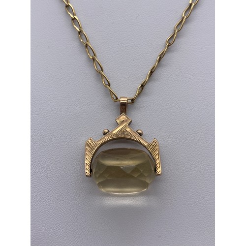 671 - 9CT GOLD CITRINE SWIVEL PENDANT ON A LONG LINKED TRACE CHAIN 11G OVERALL