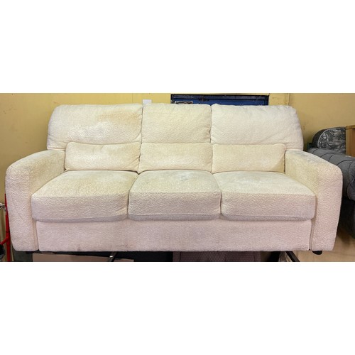 76 - CREAM BOUCLE SOFA WITH MOLESKIN SIDE PANELS