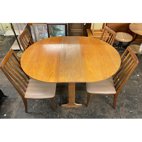 111 - TEAK OVAL DINING TABLE AND FOUR CHAIRS