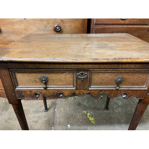 88 - 18TH CENTURY OAK LOW BOY/SIDE TABLE ON TAPERED LEGS WITH PAD FEET