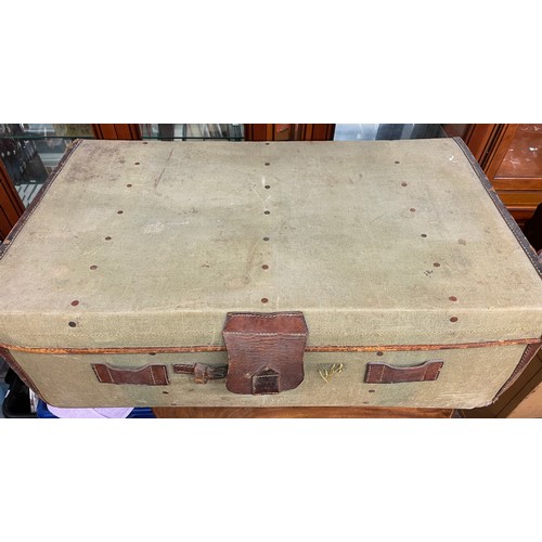 90 - CANVAS AND LEATHER STRAPPED LUGGAGE TRUNK