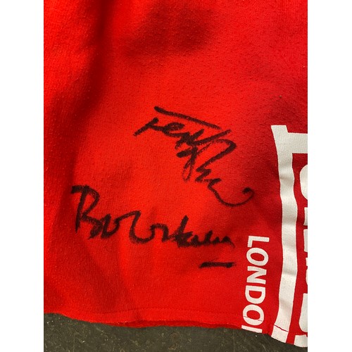 104 - RED LONSDALE T SHIRT/VEST AND SHORTS SIGNED BY FRANK BRUNO