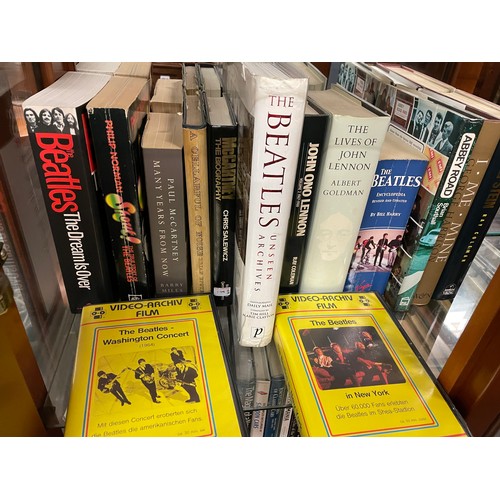 109 - TWO SHELVES OF HARD BACK AND PAPER BACK BOOKS ON THE BEATLES, ROLLING STONES, AND RELATED